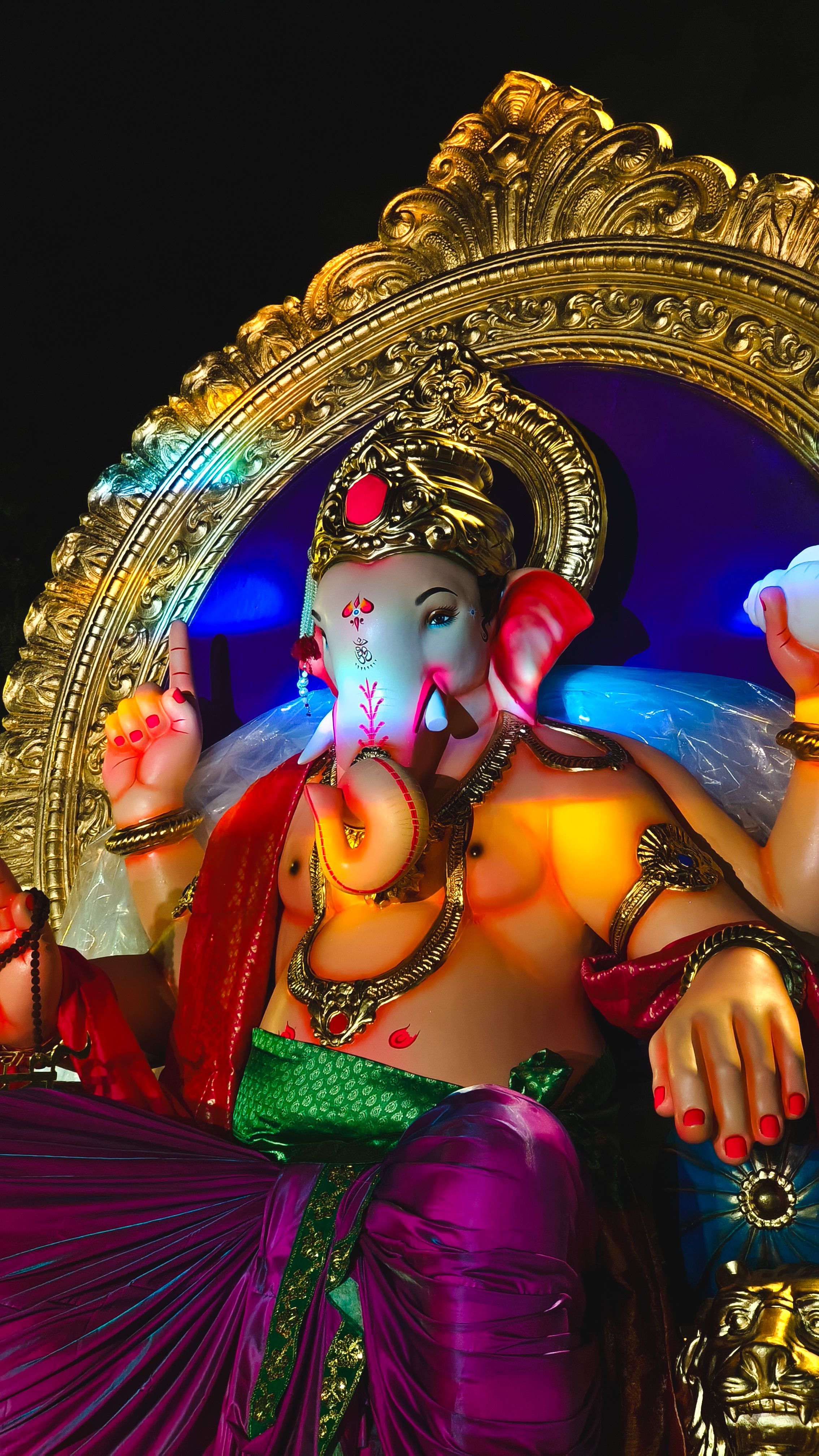 Colorful Ganesh idol in Mumbai during vibrant Ganesh Chaturthi festival.