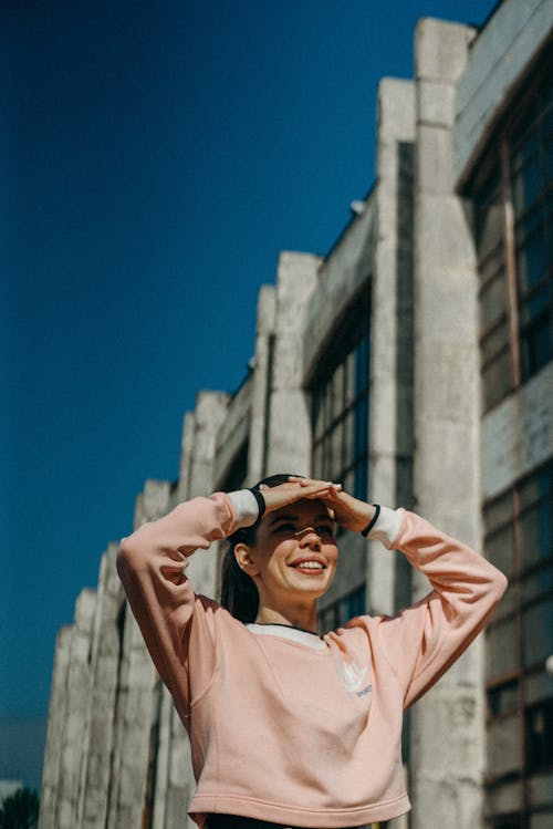 Woman Covering Her Eyes With Her Hand's Shadow