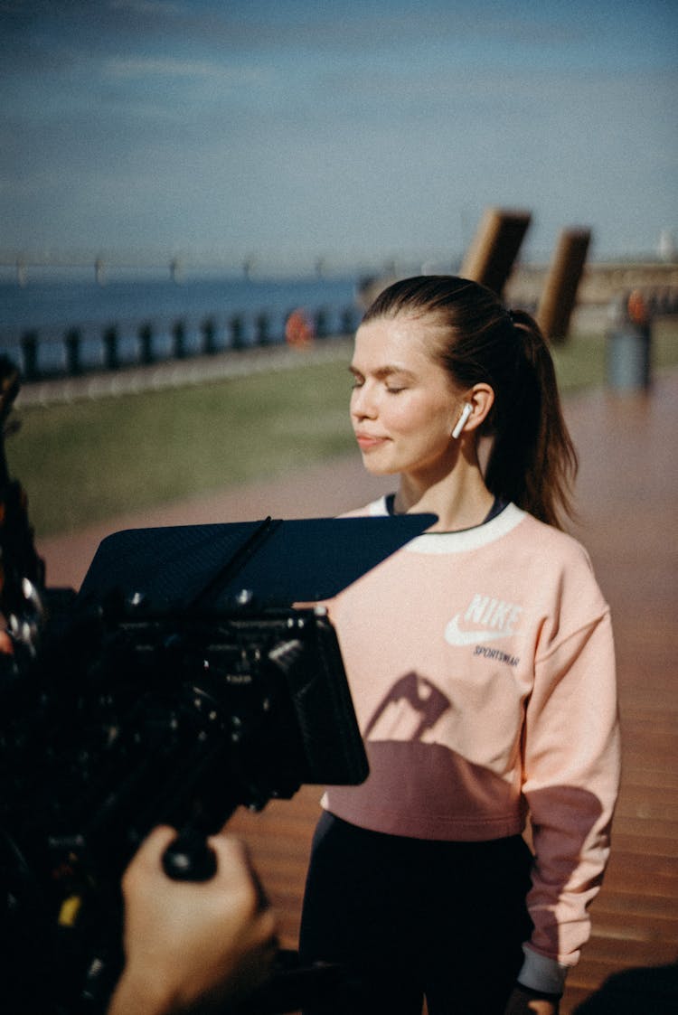 Woman Wearing Pink Sweater