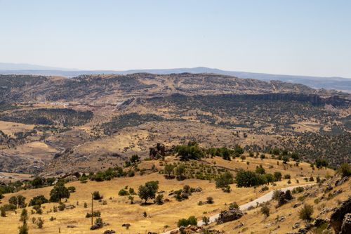 Free A stunning arid landscape near Çermik, Diyarbakır, showcasing hills, valleys, and sparse vegetation. Stock Photo