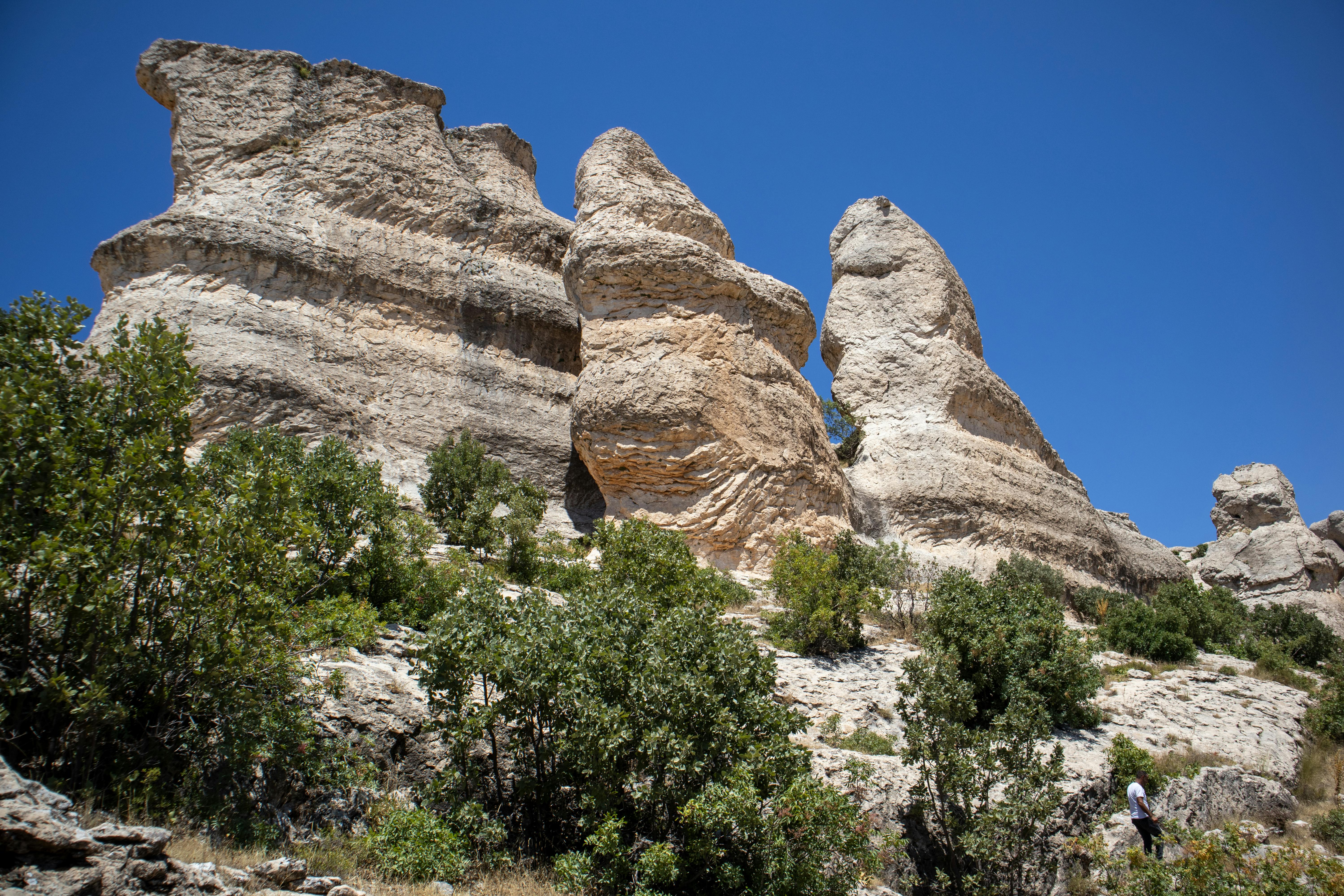 the rock formations are on a sunny day