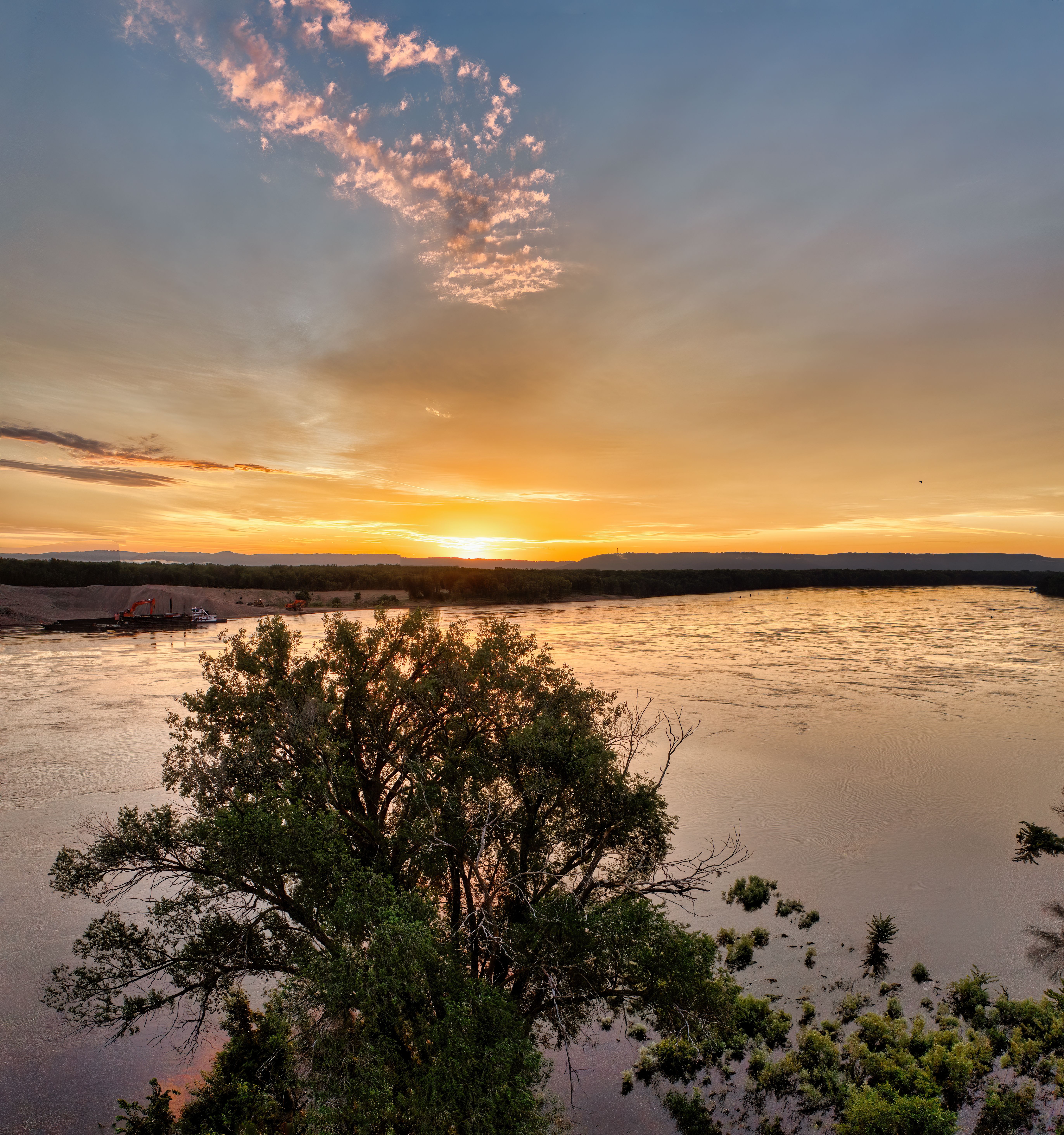 A sunset over the river with trees and a tree · Free Stock Photo