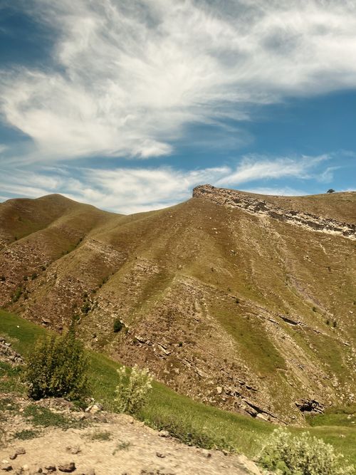 Free Discover the breathtaking landscapes of Dagestan with rolling hills and clear skies. Stock Photo