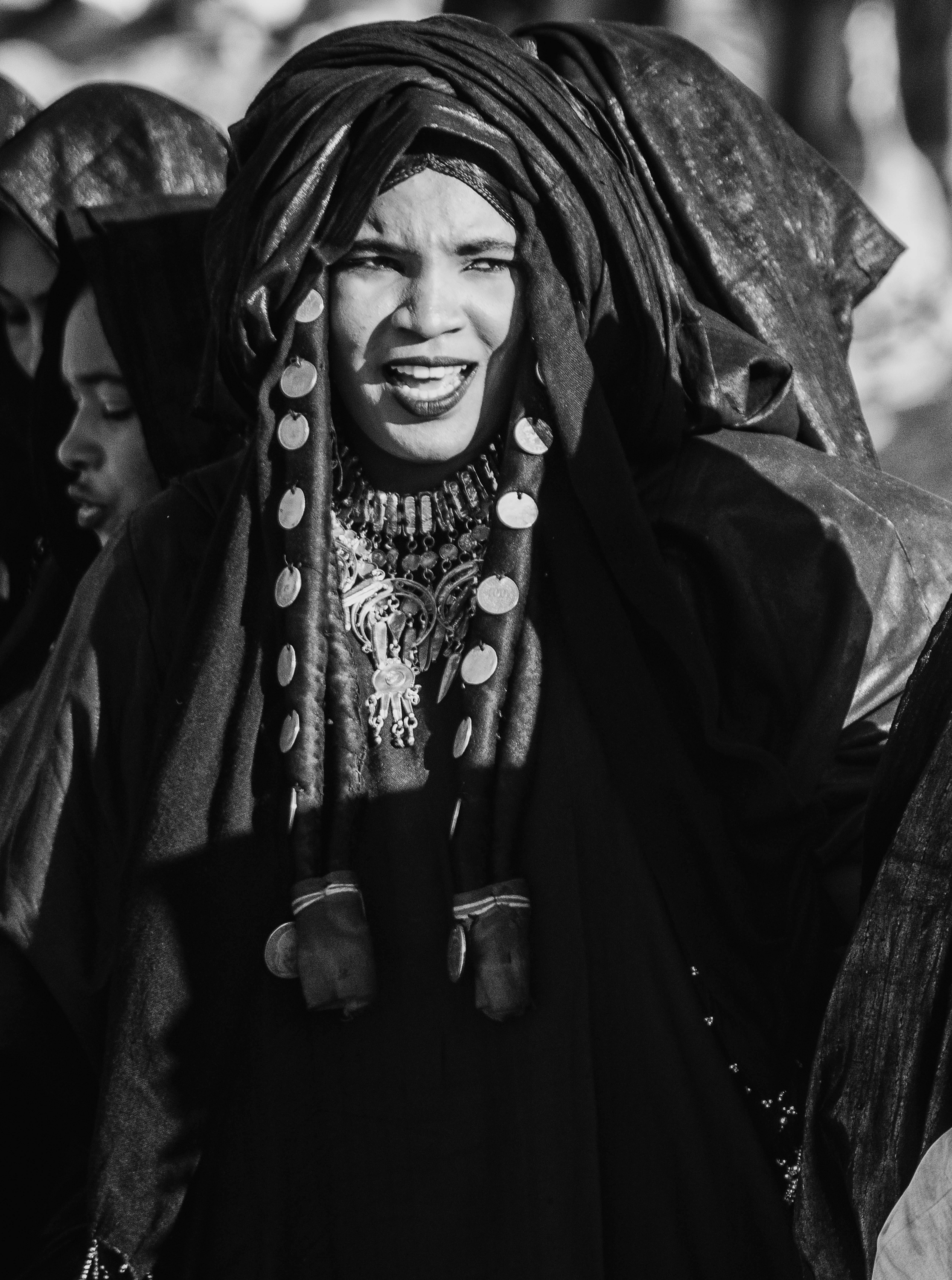 grayscale photography of woman near outdoor