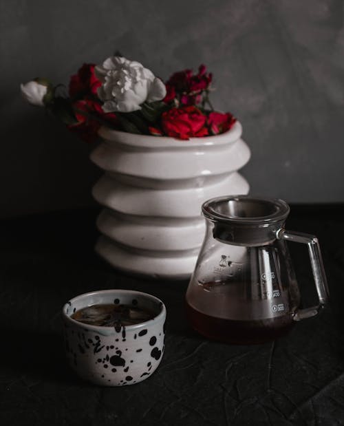 Free Clear Glass Teapot Beside Cup Stock Photo