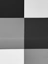 A black and white photo of a black and white checkerboard