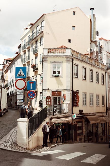 Explore Lisbon's traditional architecture with this scenic street corner in the historic old town.