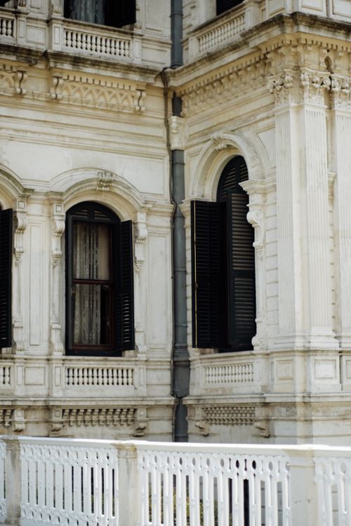 Free Detailed view of a classic architectural facade with ornate columns and windows in Istanbul, Turkey. Stock Photo