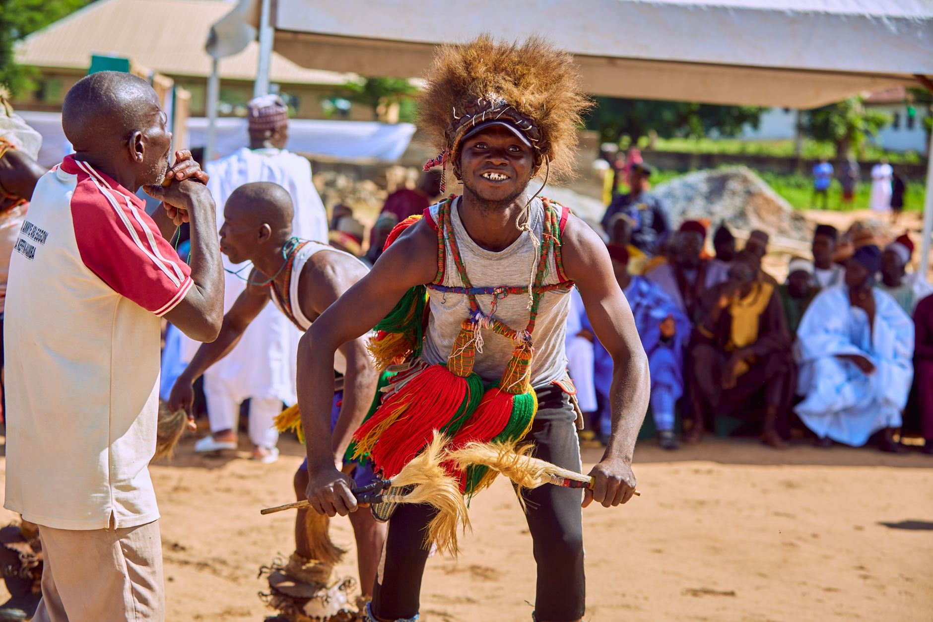 Energetic tribal dance performance at a festival in Lafia, Nigeria.