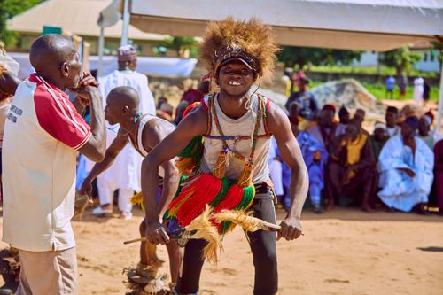 Free Energetic tribal dance performance at a festival in Lafia, Nigeria. Stock Photo