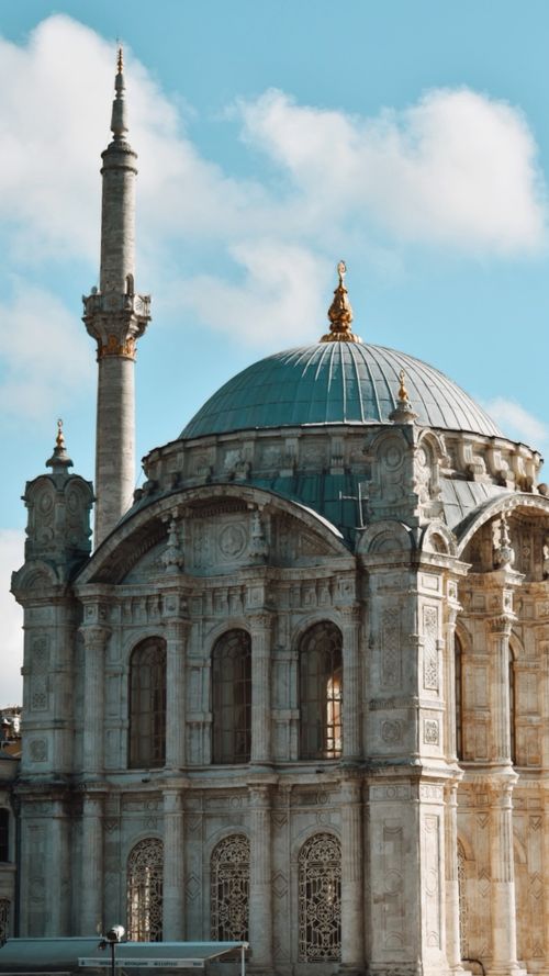 Free Elegant view of the Baroque-style Ortaköy Mosque with its distinctive domes and minarets in Istanbul. Stock Photo