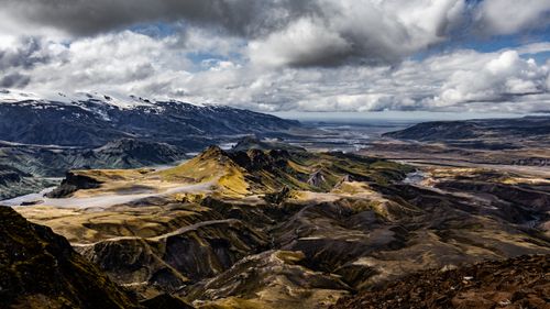 Free Breathtaking view of Iceland's highlands showcasing diverse terrain and dramatic skies. Stock Photo
