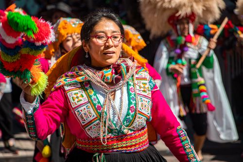 Free Vibrant traditional dance celebration on the streets of Cusco, Peru, showcasing rich cultural attire. Stock Photo