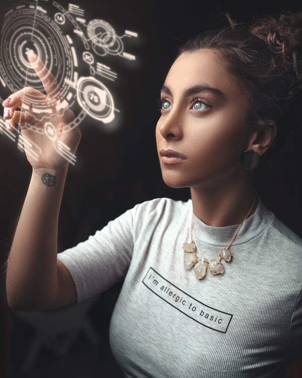 Person interacting with holographic digital interface