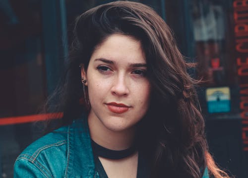 Photo Of Woman Wearing Denim Top