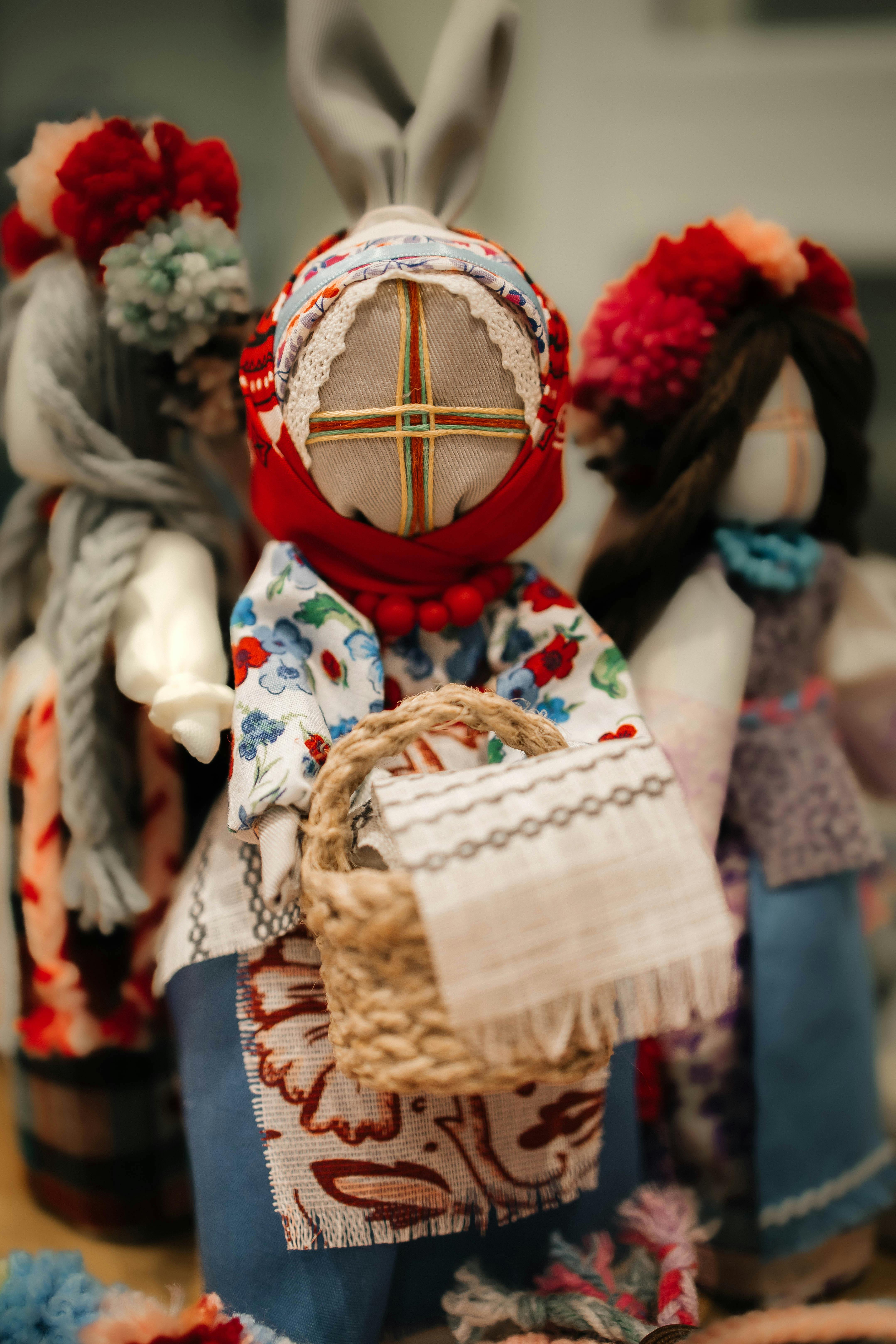 a group of dolls with baskets and baskets