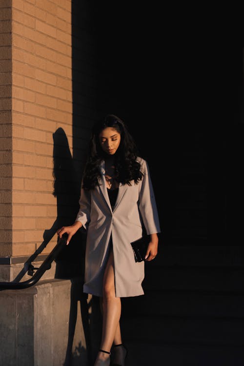 Woman Wearing White Coat