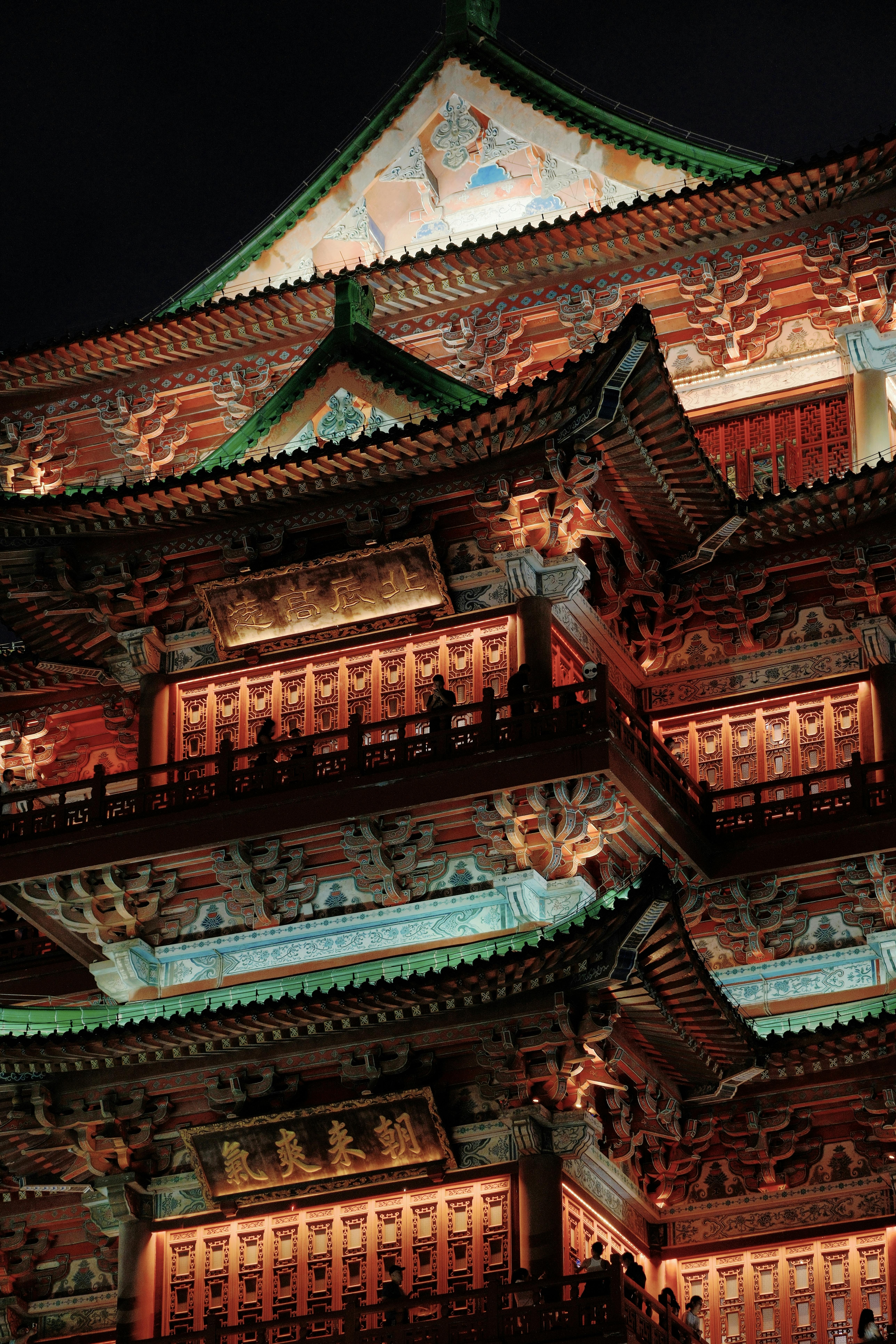 A stunning view of a traditional Chinese temple illuminated at night in Nanchang, China.