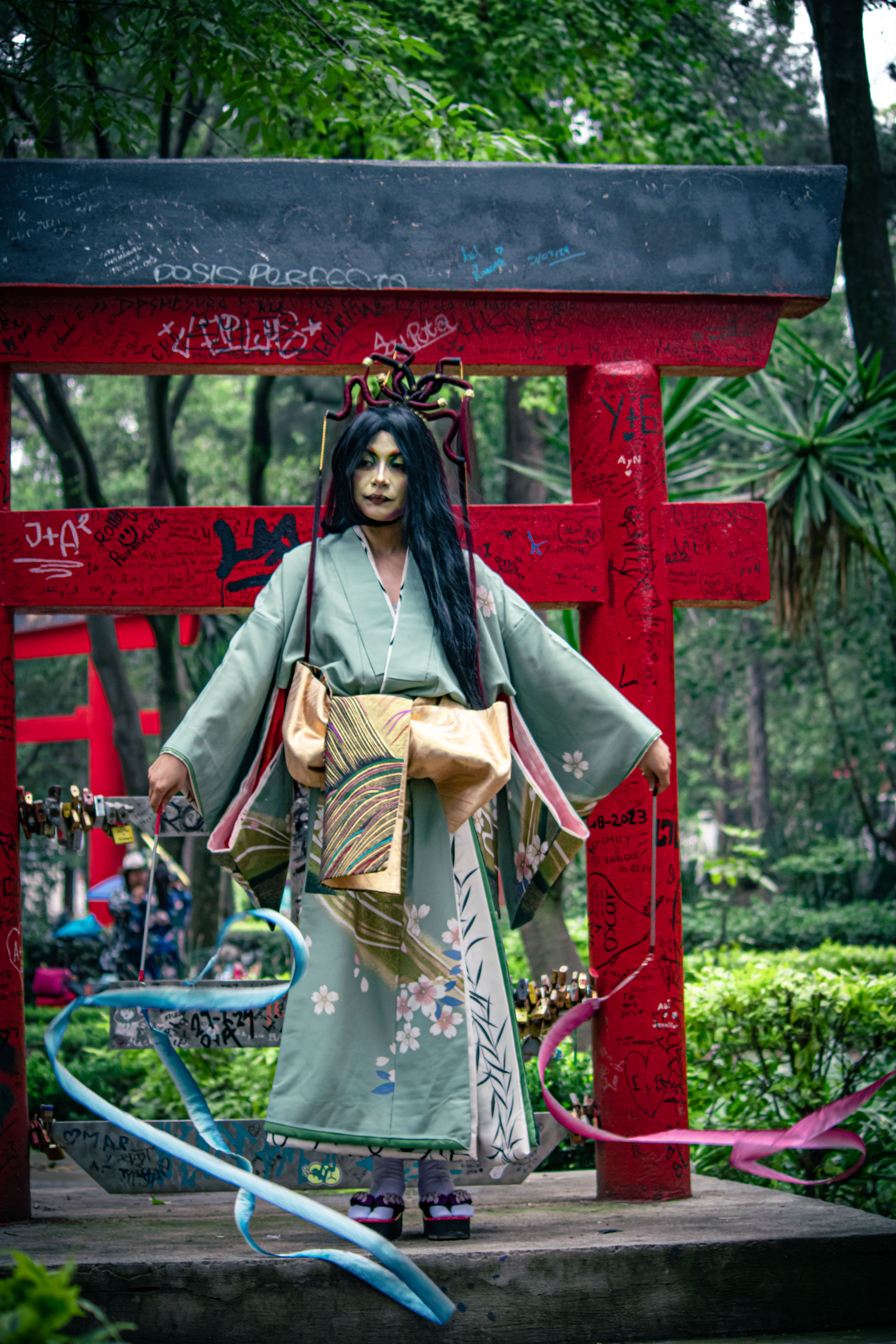 Person in traditional Japanese costume at a festival in Mexico City, showcasing cultural fusion.