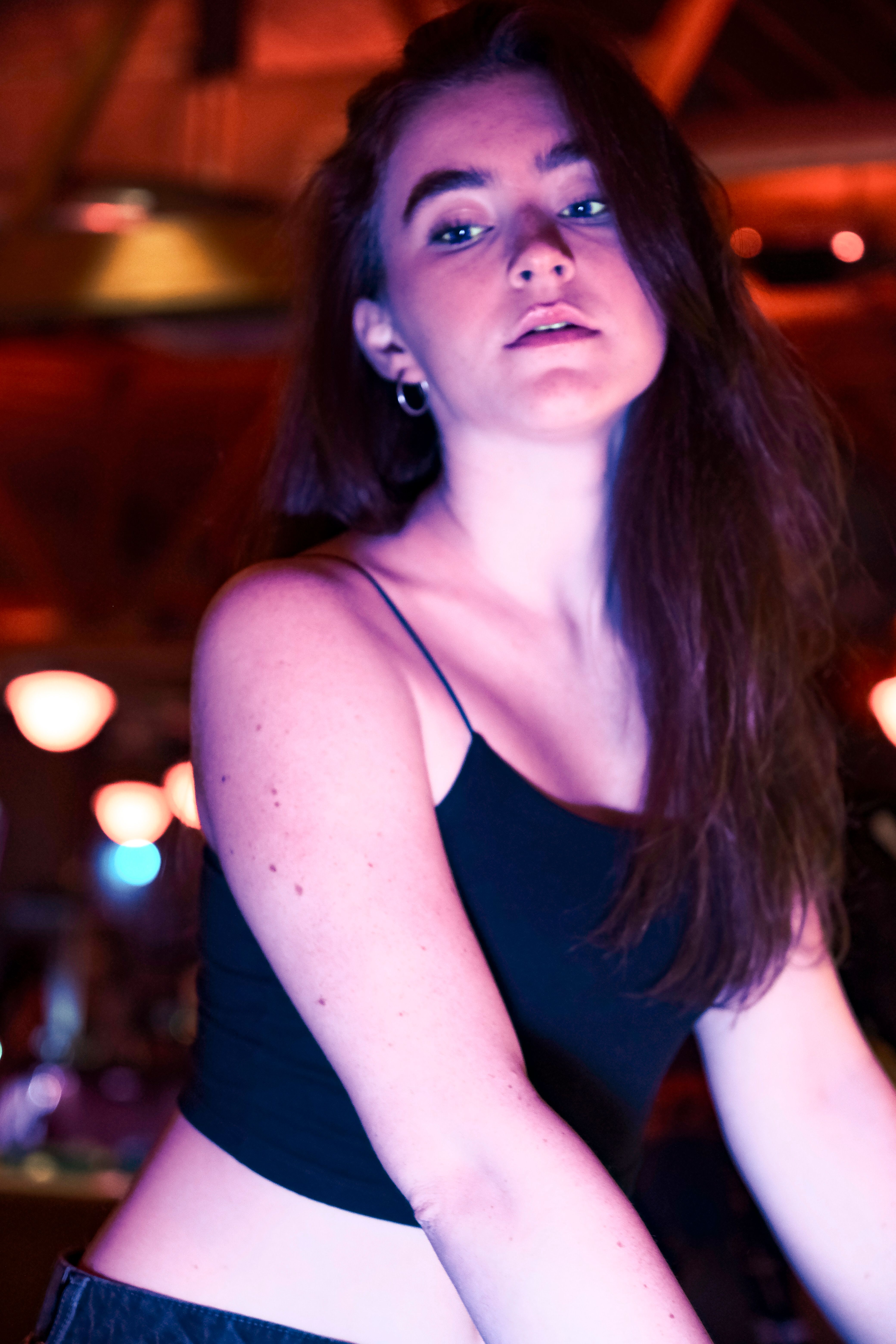 A young woman in a black top and skirt · Free Stock Photo