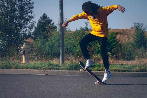 Man Playing Skateboard