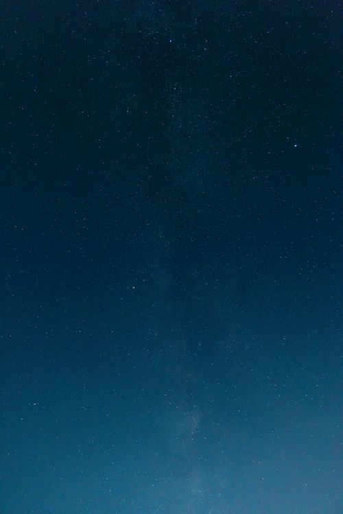 Free A breathtaking view of a dark starry night sky filled with countless twinkling stars. Stock Photo