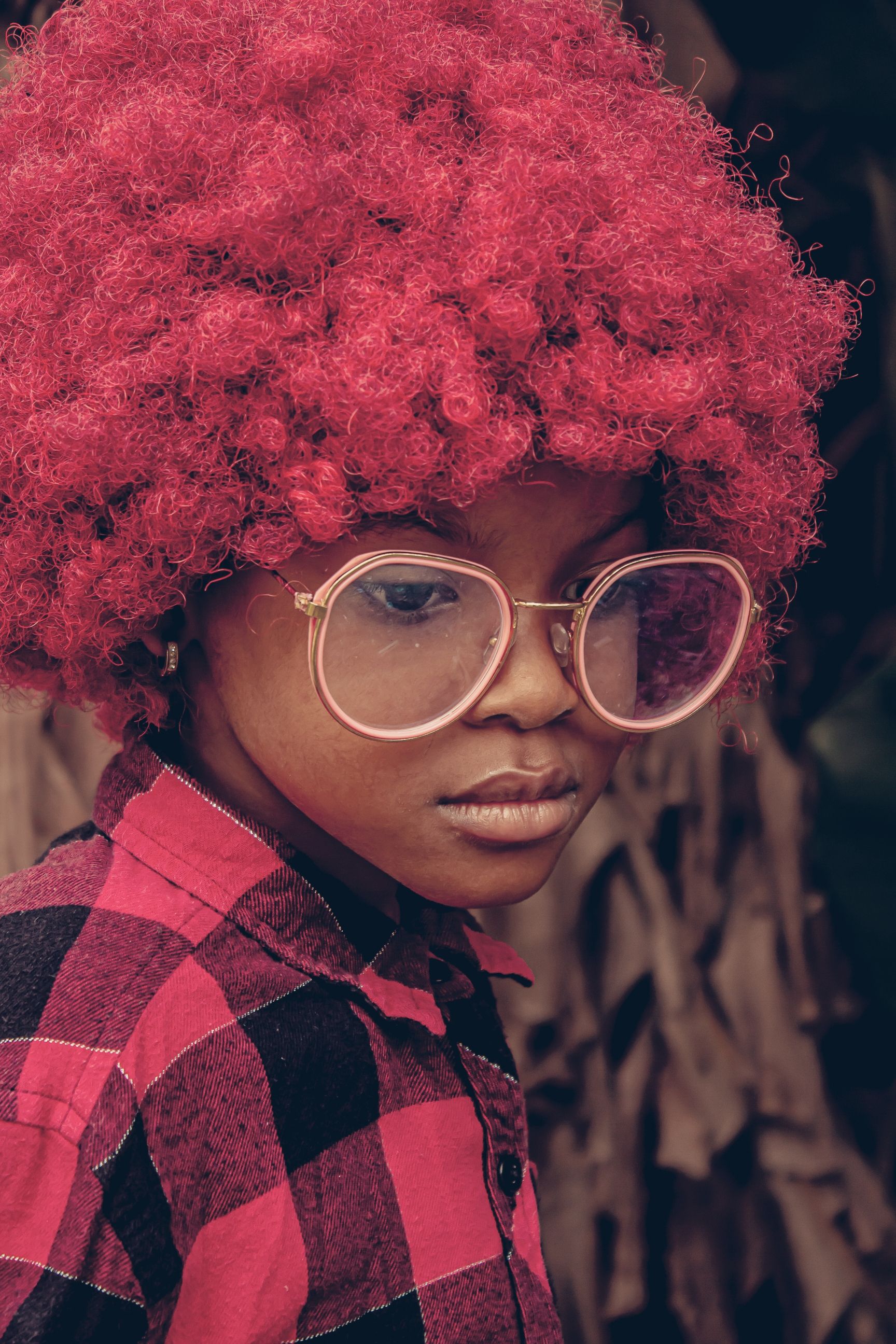 A young girl with red hair and glasses · Free Stock Photo