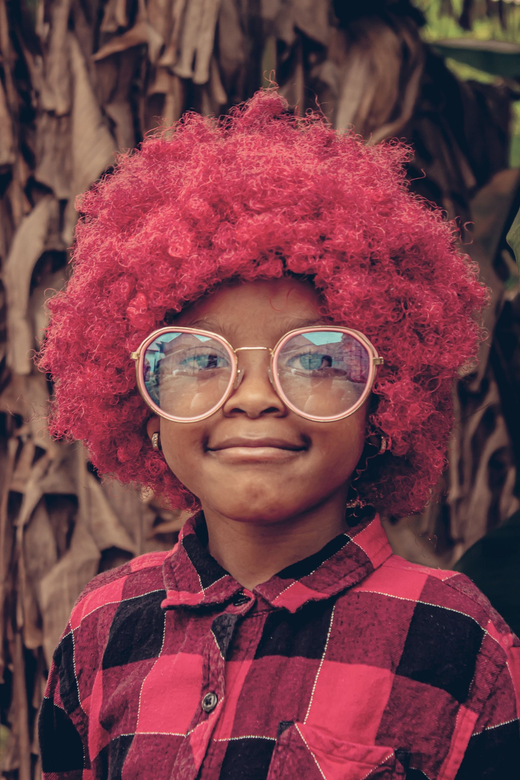 A young girl with red hair and glasses · Free Stock Photo
