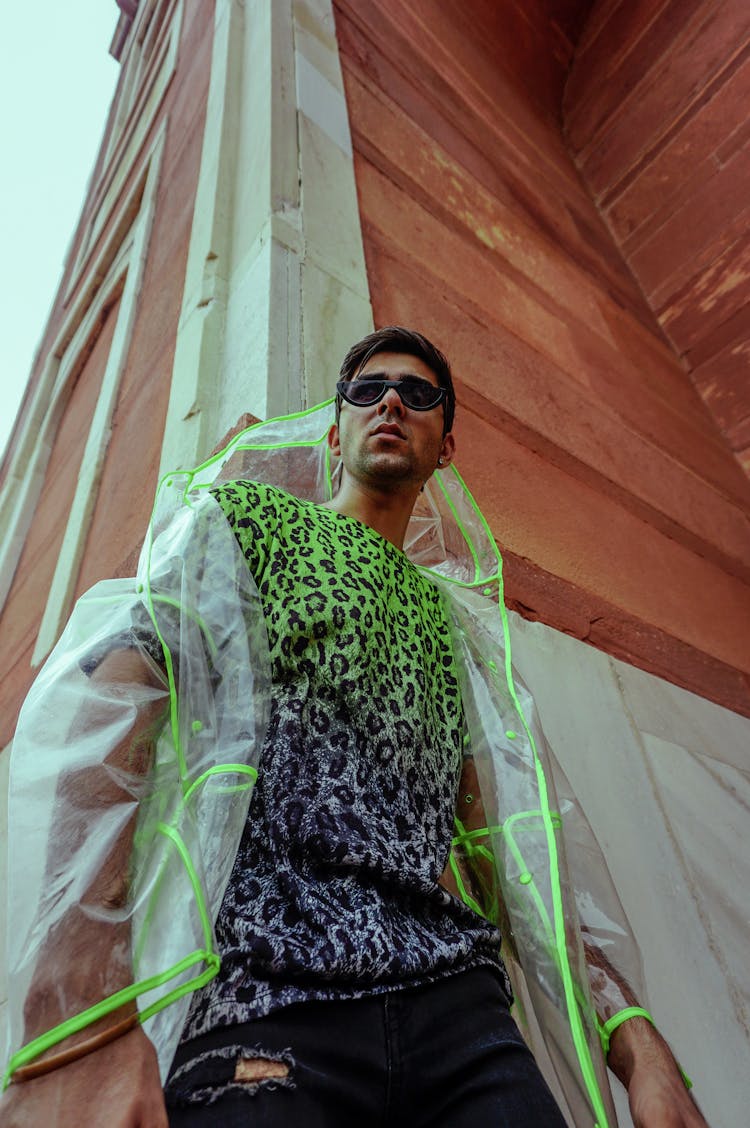 Low Angle Photo Of Man Wearing Sunglasses