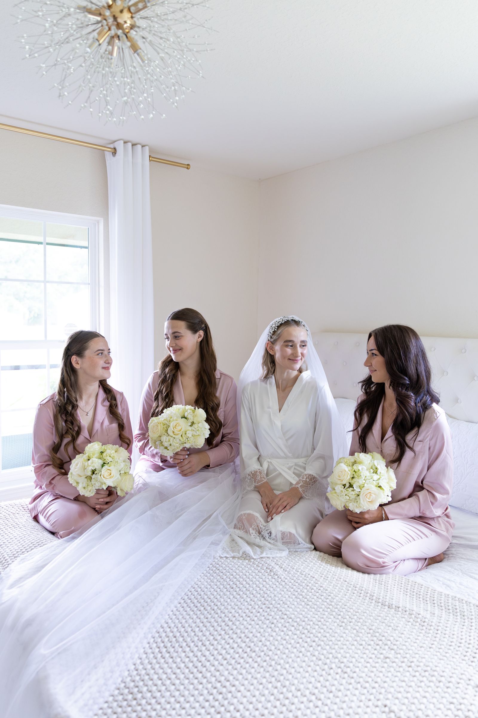 Bridesmaids in pink robes getting ready - bachelorette party limo service NJ