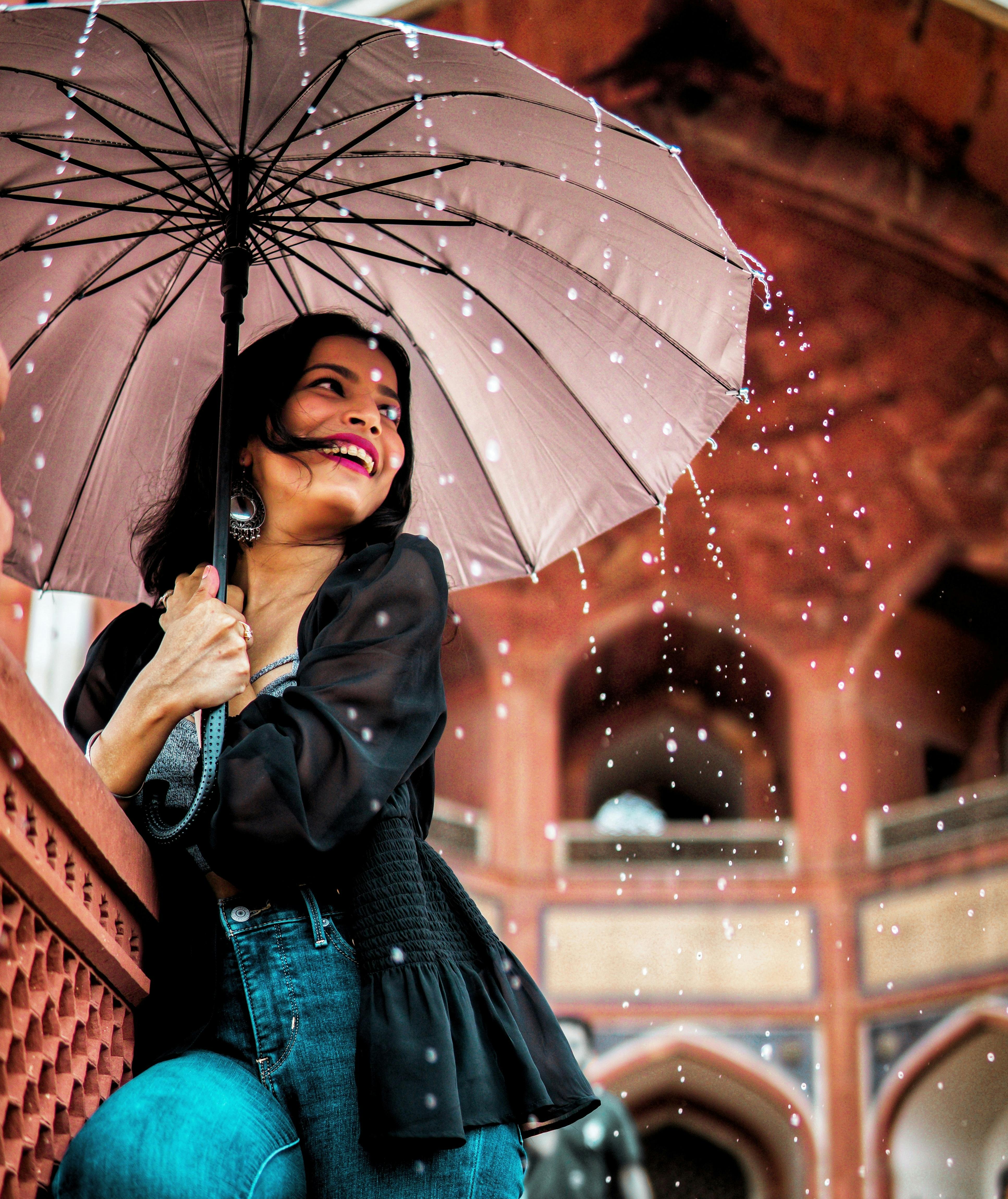 girl with umbrella in rain