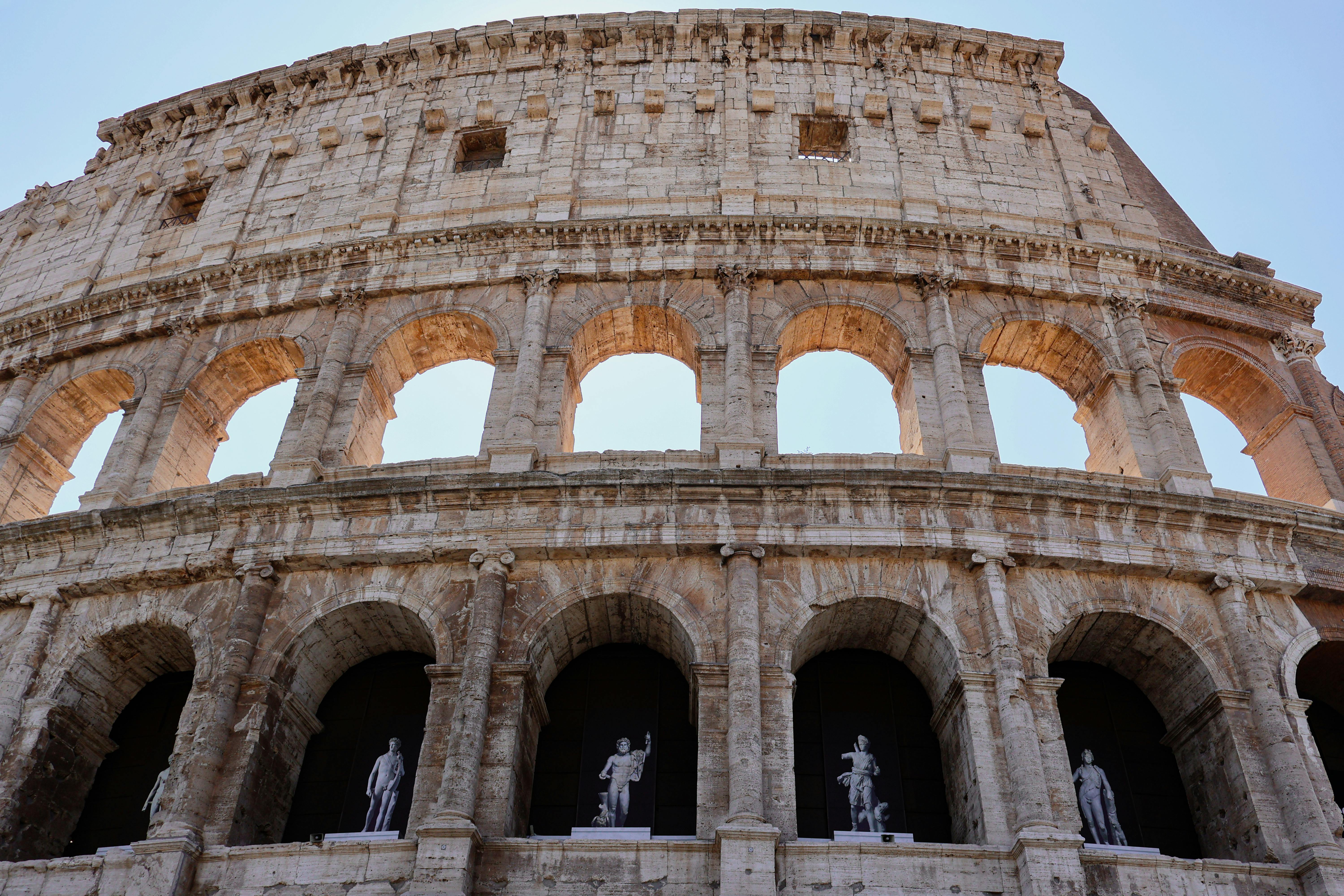 Free Close-up of the iconic Colosseum, a symbol of Roman architectural prowess, in Rome, Italy. Stock Photo