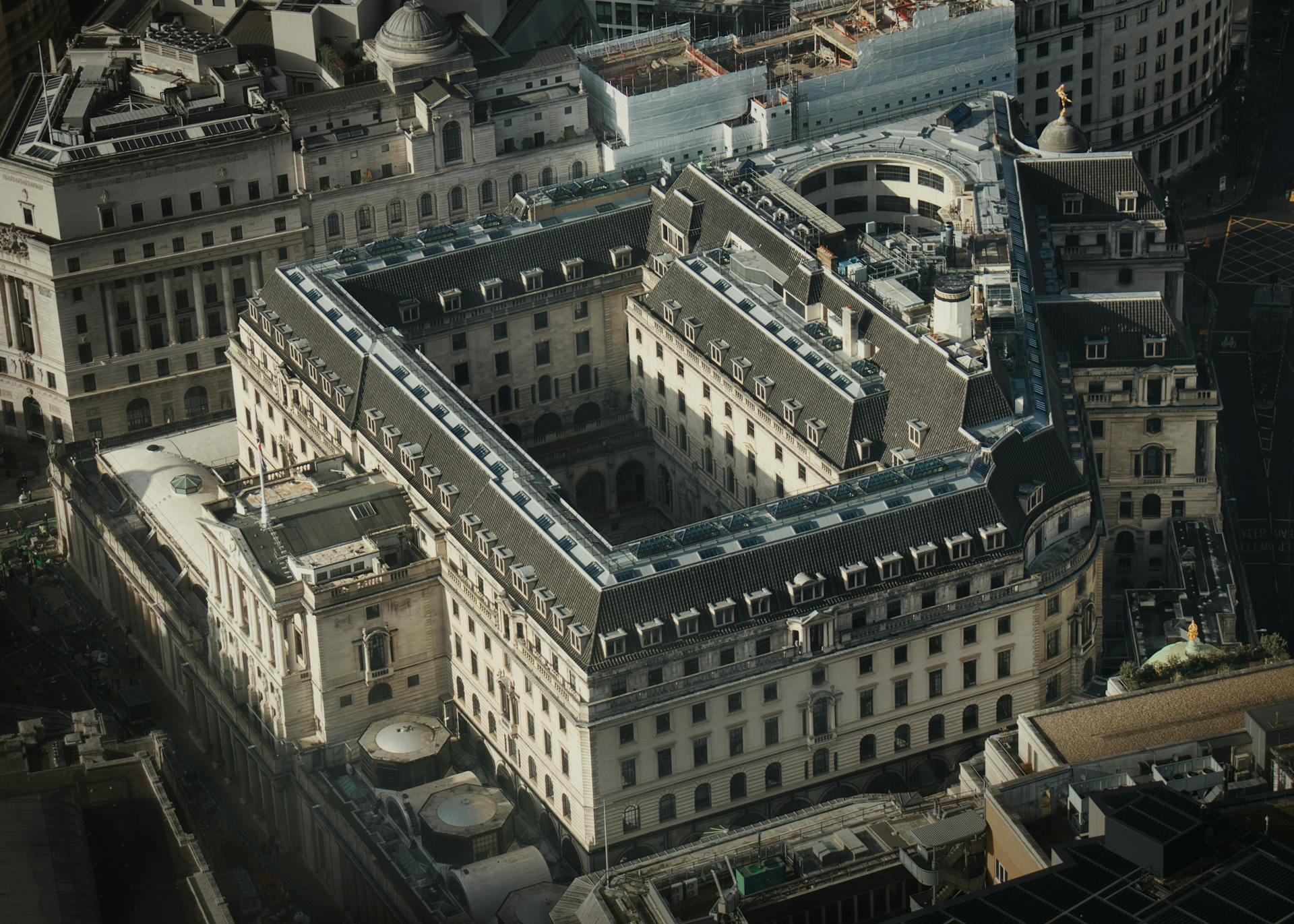 A detailed aerial shot of the historical Bank of England in London, showcasing its grand architecture.