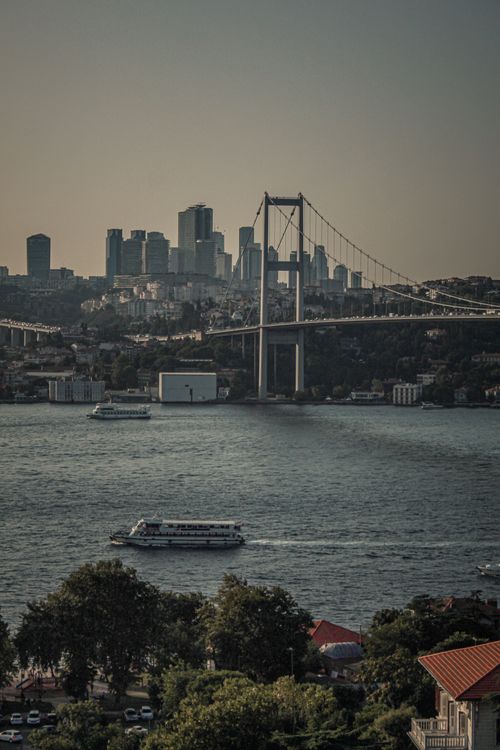 Free A beautiful view of the Bosphorus Bridge with Istanbul's skyline in the background, capturing the essence of this iconic city. Stock Photo