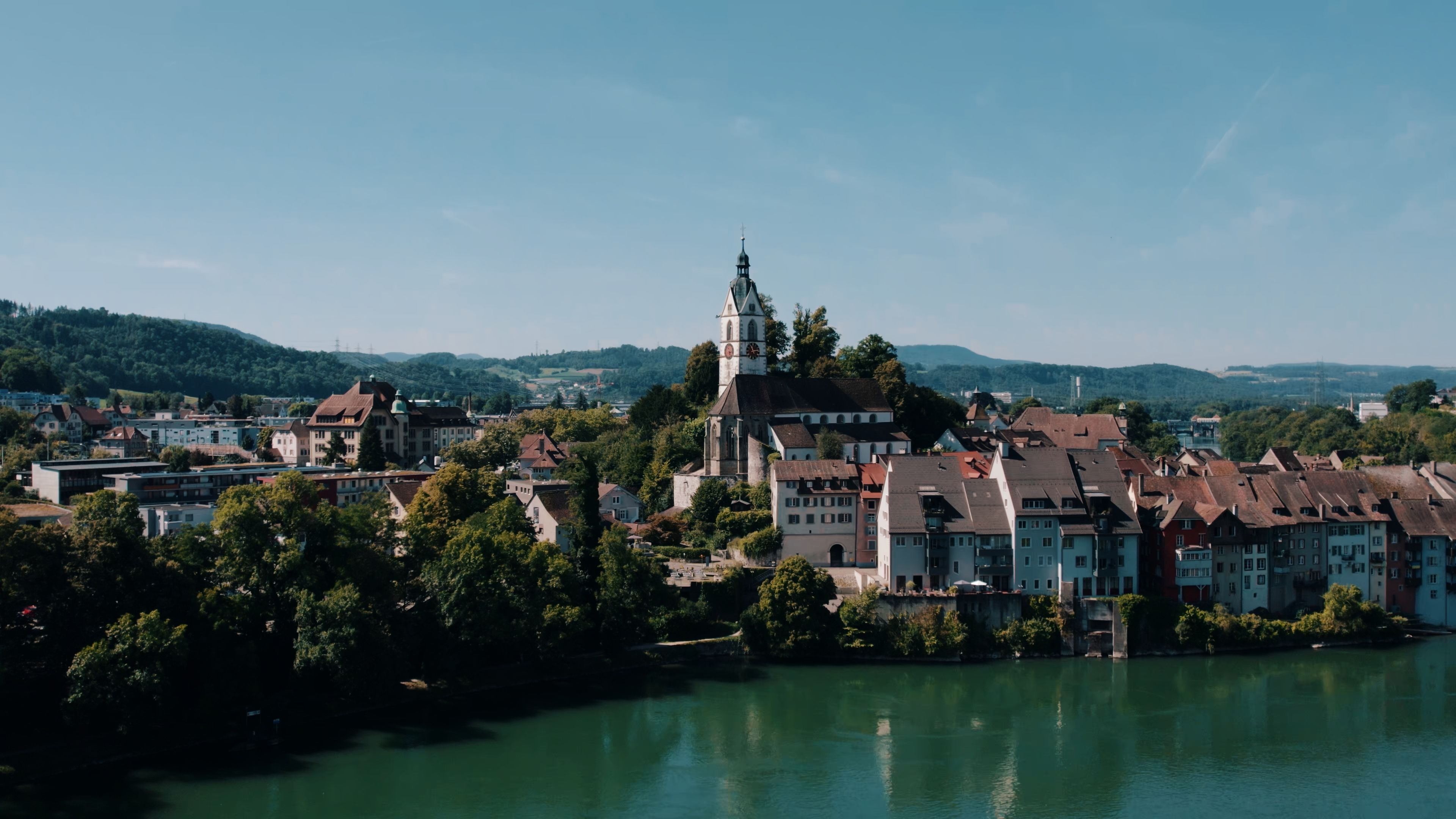 Amazing Helicopter Flight with a Stop at Villa Honegg for Lunch Review Review 2026 - Scenic aerial view of Laufenburg with historical architecture by River Rhine.