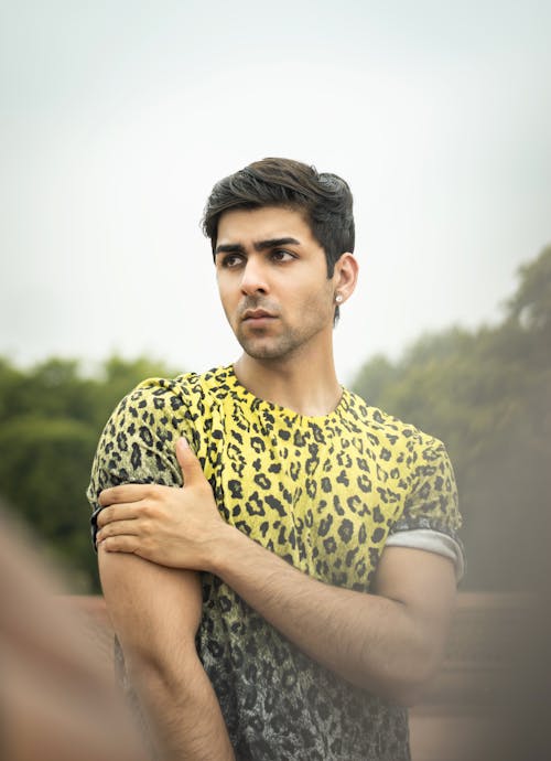 Man Wearing Yellow Printed Shirt