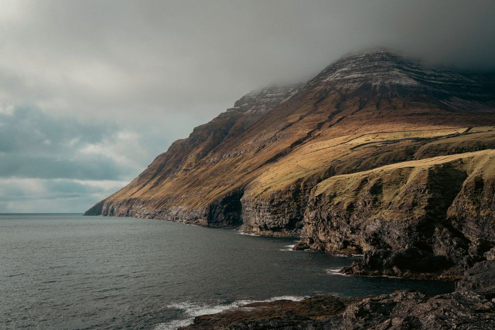 Misty sea cliffs of the Faroe Islands — Raul Ling on Pexels