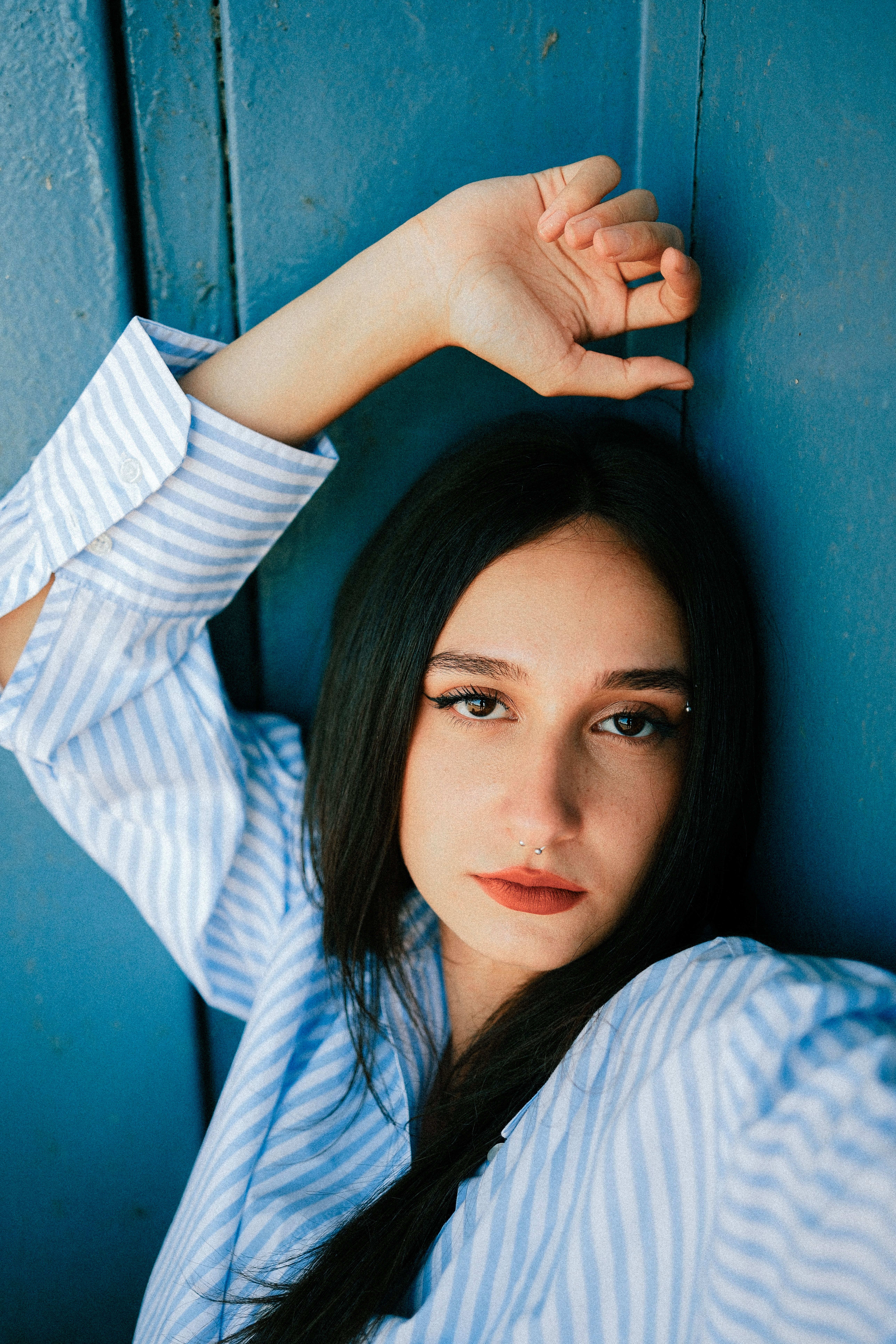 Portrait of a Young Woman in a Striped Shirt · Free Stock Photo