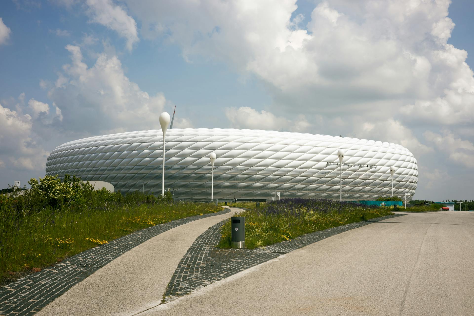 A large white building with a large roof