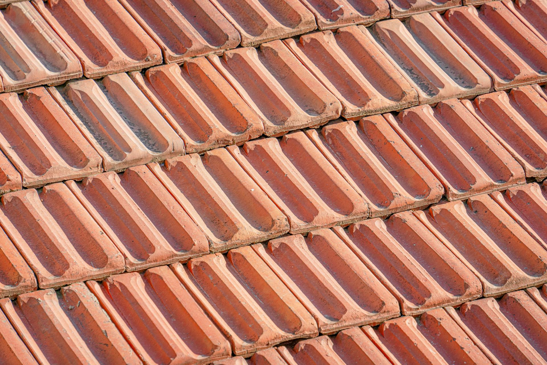 A close up of a red clay roof