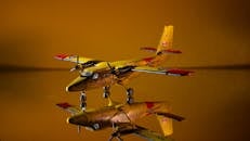 A small model airplane is sitting on a table