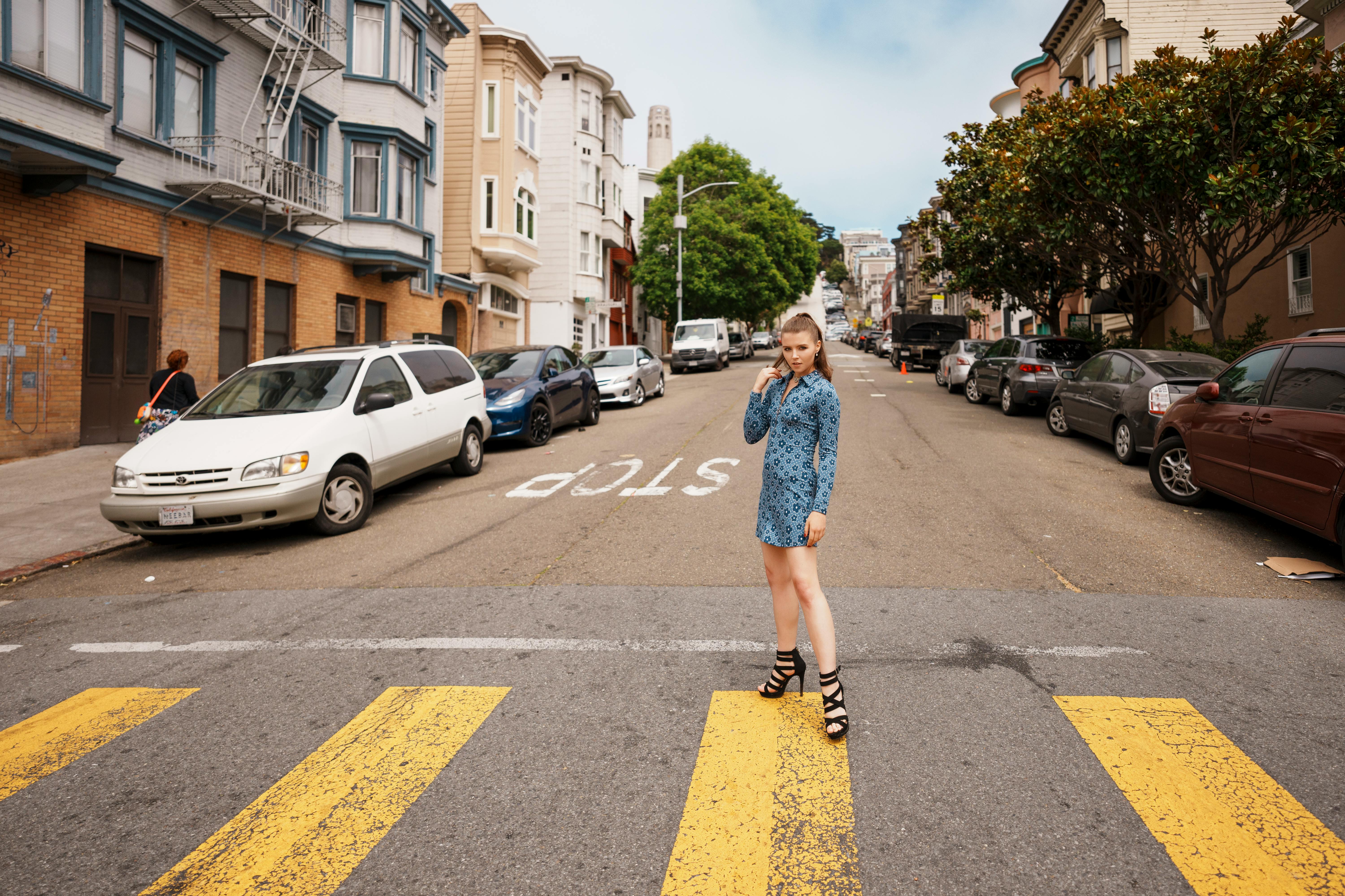 beautiful young woman crosswalk san francisco