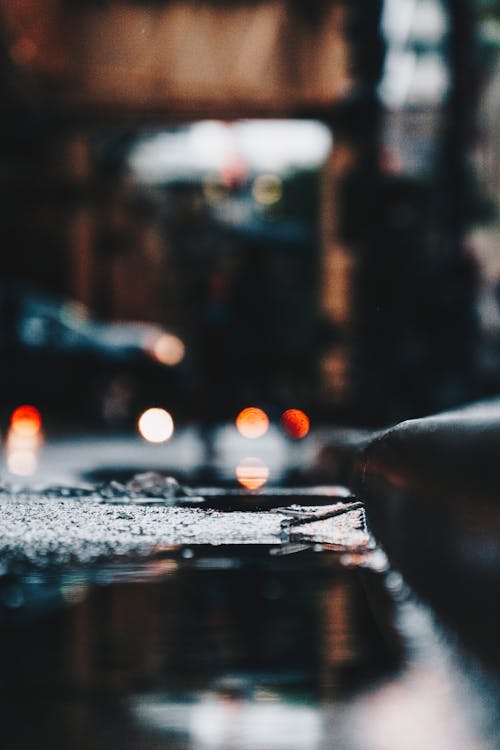 Close-Up Photo of Wet Sidewalk