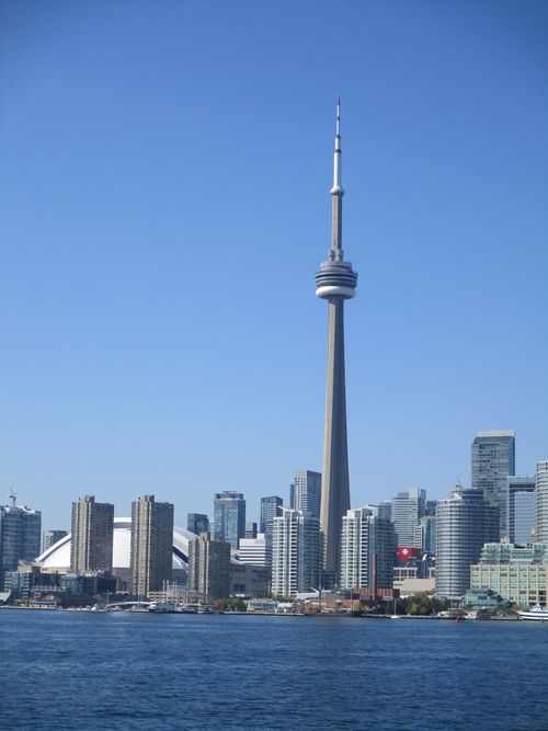 Free Stunning view of Toronto skyline with the CN Tower on a clear day from waterfront. Stock Photo