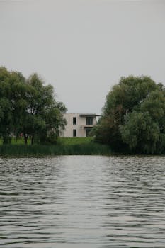 Beautiful modern house surrounded by nature by a tranquil lake in Hungary