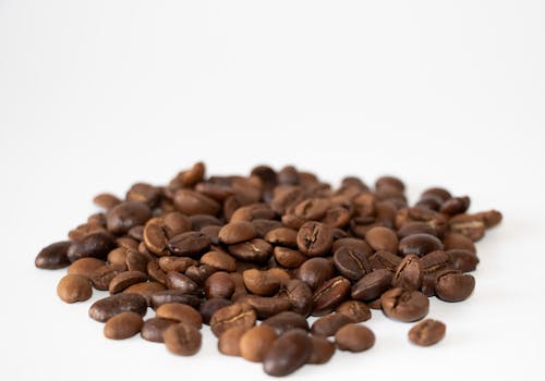A detailed image showcasing roasted coffee beans, perfect for gourmet or cafe-themed uses.