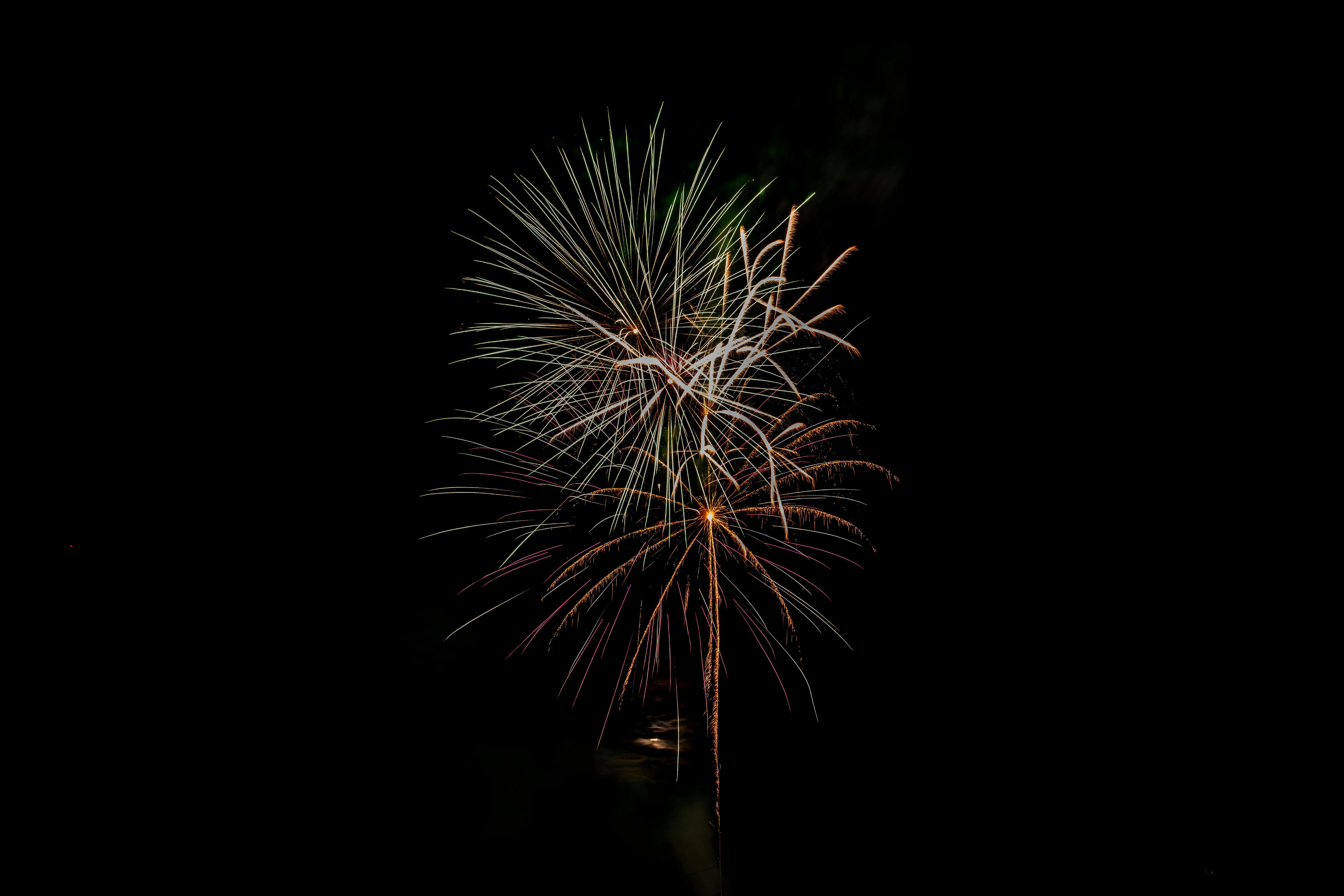 Vibrant fireworks illuminate the night sky during a festival celebration in Milton, ON.
