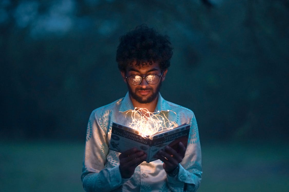 Free Man Holding Book Stock Photo