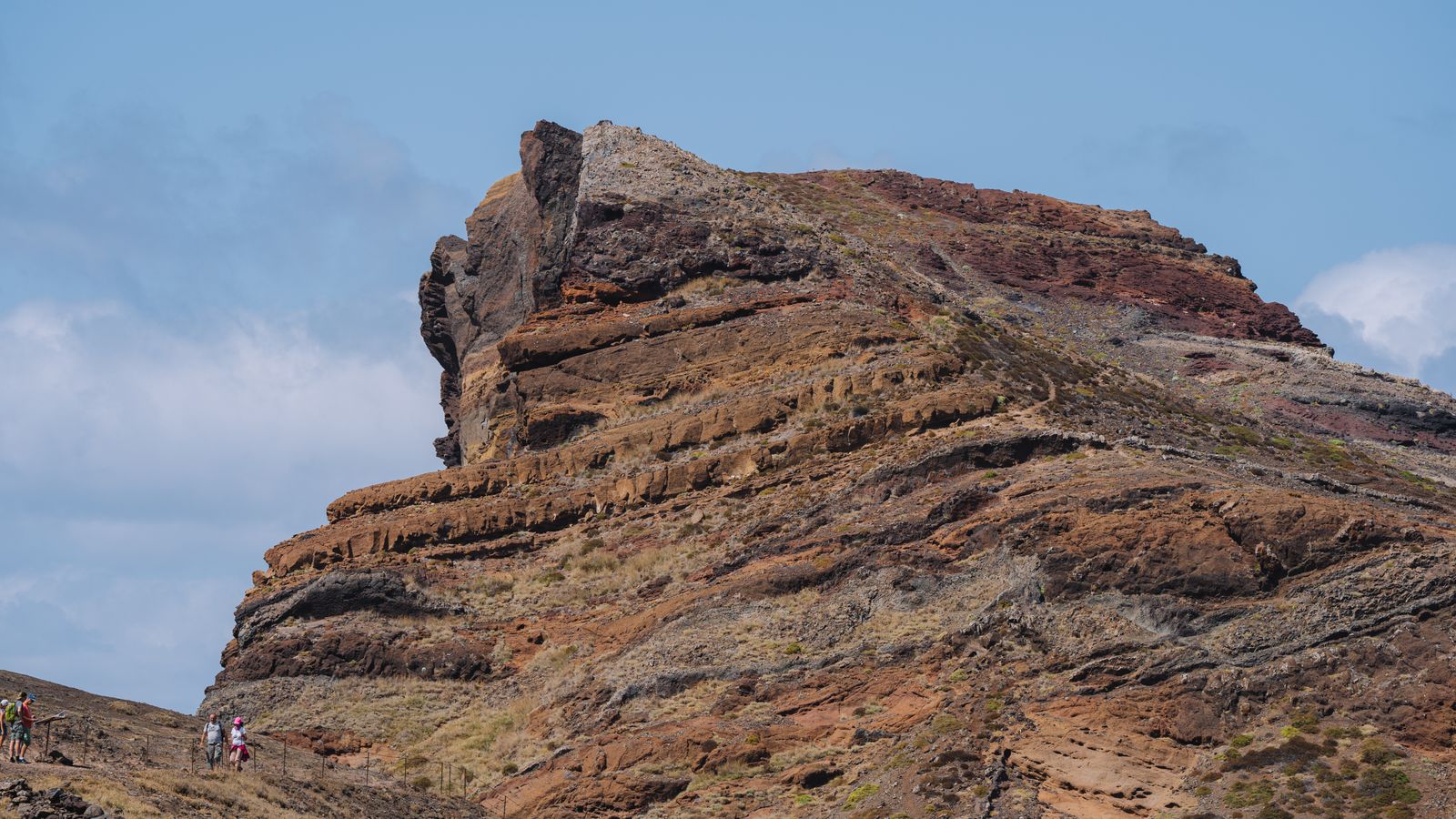 A person standing on top of a rocky hill, Cabo Verde
