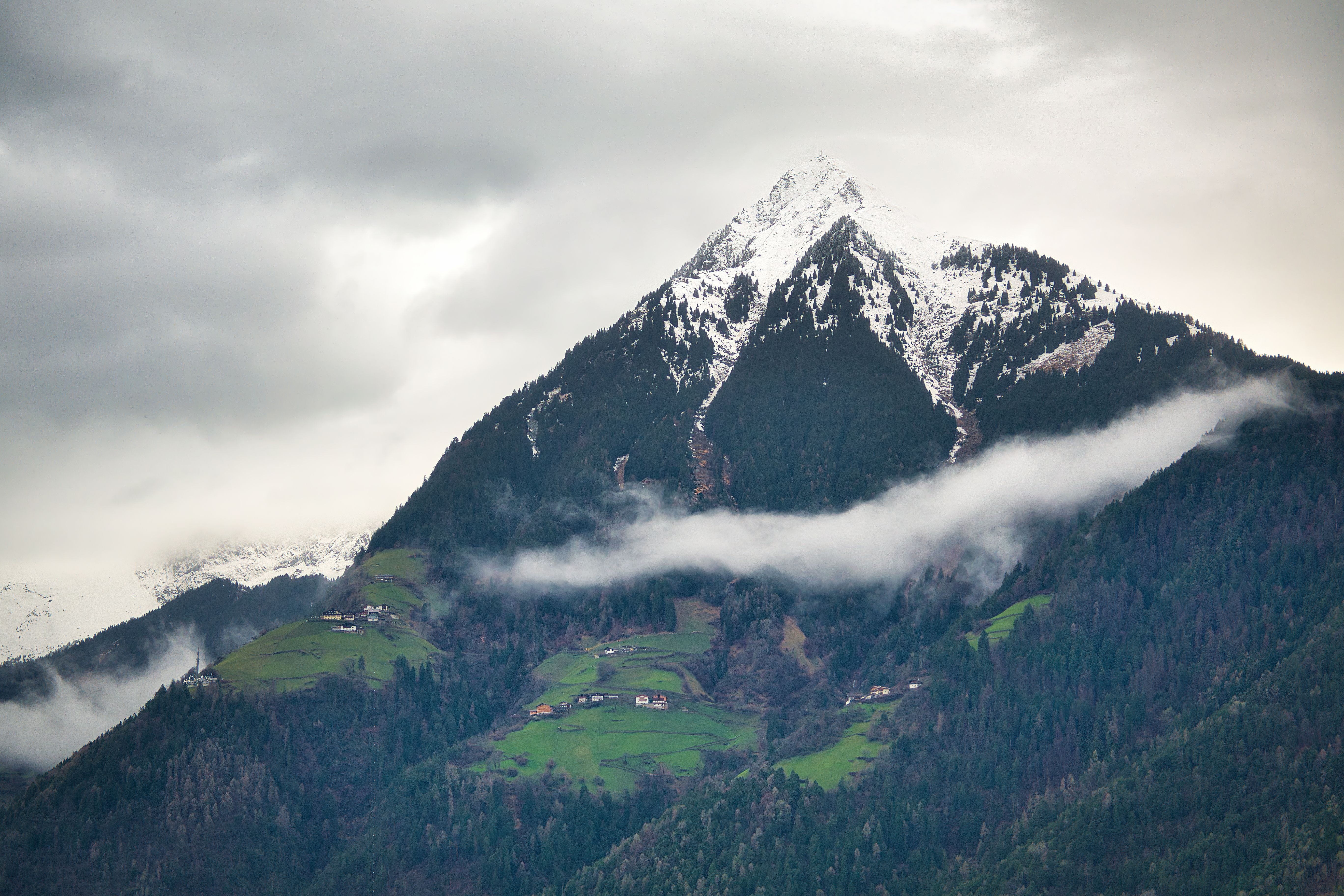 Breathtaking view of a snow-capped mountain peak in Dorf Tirol, Trentino-Südtirol, Italy.